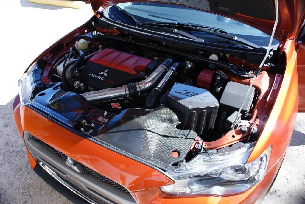 Rotor Glow Orange Evo X in Puerto Rico by AutoLavish